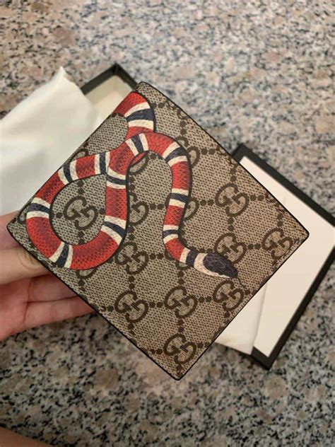 black gucci wallet replica|authentic gucci snake wallet.